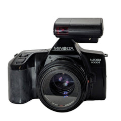 Minolta  Maxxum  3000i camera with two lenses
