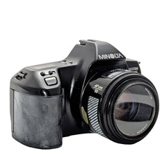 Minolta  Maxxum  3000i camera with two lenses