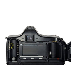 Minolta  Maxxum  3000i camera with two lenses