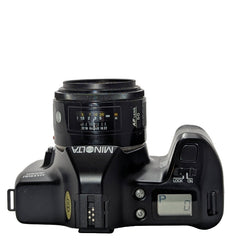 Minolta  Maxxum  3000i camera with two lenses