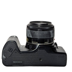 Minolta  Maxxum  3000i camera with two lenses