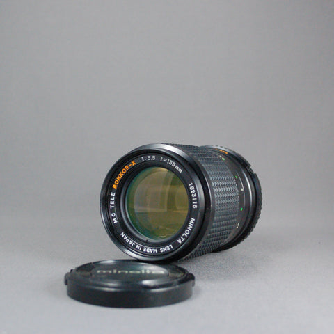 Minolta MC Tele Rokkor-X 135mm 3.5 Lens – Used Near Mint  Moderate telephoto prime lens.