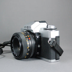 Minolta XG-1 Camera, Minolta MD 50mm f 1.7 lens, and Minolta Auto 118X flash  Complete Kit– Used Excellent Plus