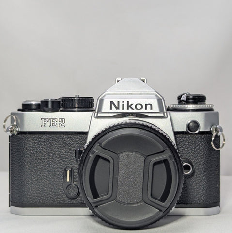 Chrome Nikon FE2 35mm Film Camera w. Nikkor50mm f1.8 lens
