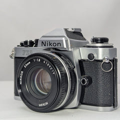 Chrome Nikon FE2 35mm Film Camera w. Nikkor50mm f1.8 lens