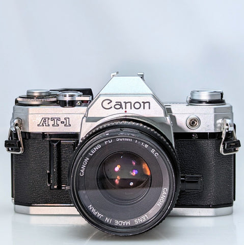 Canon AT-1 35mm film SLR camera w/ 50mm f1.8 Canon FD lens.