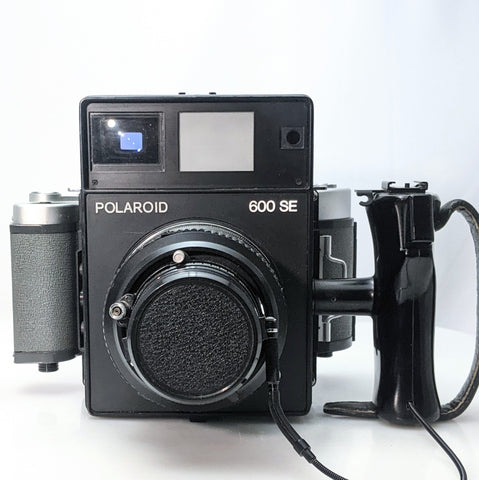 Polaroid 600 SE medium format film camera w/Mamiya 127mm f4.7 lens and a Mamiya 6x9 back  Very good condition