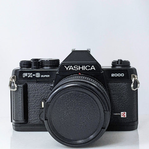 Yashica FX-3 super 2000 35mm film Camera Black w\ Yashica 42-75mm f3.5-4.5 lens  Mint